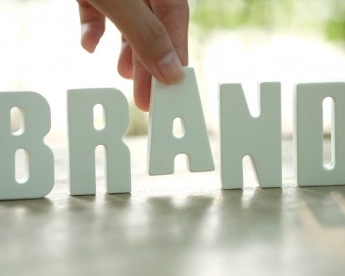 hand-arrange-white-letters-brand_1384-103